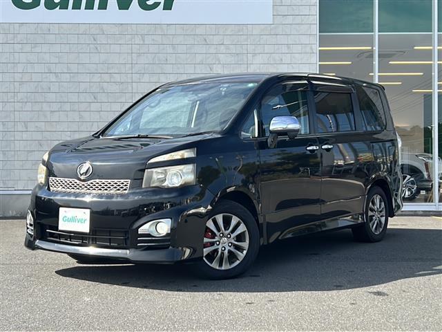 ヴォクシー ZS 煌 社外SDナビ BT CD ワンセグ バックカメラ 社外フリップダウンモニター パドルシフト 両側パワースライドドア 純正16インチアルミホイール 革巻きステアリング レザー調シートカバー HID(26枚目)