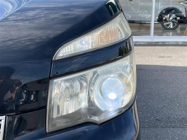 ヴォクシー ZS 煌 社外SDナビ BT CD ワンセグ バックカメラ 社外フリップダウンモニター パドルシフト 両側パワースライドドア 純正16インチアルミホイール 革巻きステアリング レザー調シートカバー HID(27枚目)