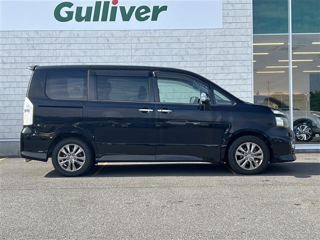 ヴォクシー ZS 煌 社外SDナビ BT CD ワンセグ バックカメラ 社外フリップダウンモニター パドルシフト 両側パワースライドドア 純正16インチアルミホイール 革巻きステアリング レザー調シートカバー HID(35枚目)