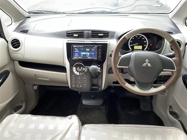 ｅＫワゴン Ｇ　バックカメラ　社外ナビ　ＢＴ／ＣＤ／ＤＶＤ／フルセグ　純正１４インチアルミホイール　ヘッドライトレベライザー純正フロアマット　ドアバイザー　スマートキー　ＥＴＣ（5枚目）