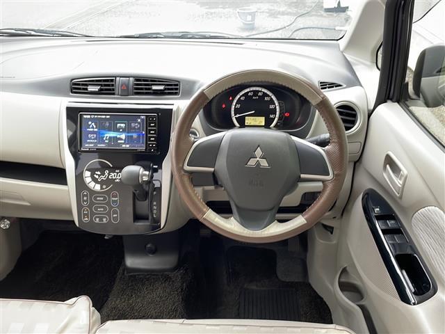 ｅＫワゴン Ｇ　バックカメラ　社外ナビ　ＢＴ／ＣＤ／ＤＶＤ／フルセグ　純正１４インチアルミホイール　ヘッドライトレベライザー純正フロアマット　ドアバイザー　スマートキー　ＥＴＣ（6枚目）