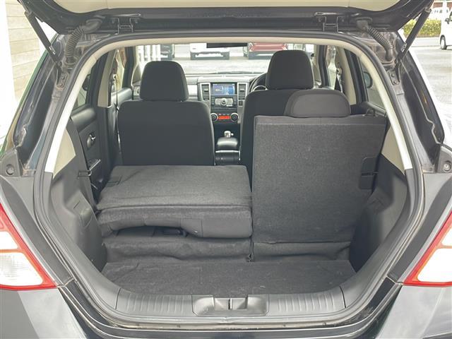 ティーダ １５Ｓ　禁煙車　ＡＭ／ＦＭ／ＣＤ／ＤＶＤ　純正ＨＤＤナビ　ワンセグＴＶ　サイドカメラ　社外ＥＴＣ　Ｗエアバッグ　ハンドルスイッチ　スマートキー　ヘッドライトレベライザー　オートエアコン　ドアバイザー　盗難防止（30枚目）