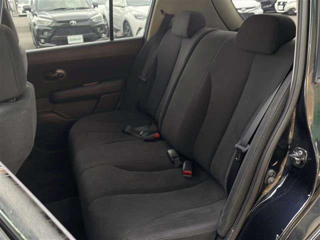 ティーダ １５Ｓ　禁煙車　ＡＭ／ＦＭ／ＣＤ／ＤＶＤ　純正ＨＤＤナビ　ワンセグＴＶ　サイドカメラ　社外ＥＴＣ　Ｗエアバッグ　ハンドルスイッチ　スマートキー　ヘッドライトレベライザー　オートエアコン　ドアバイザー　盗難防止（38枚目）