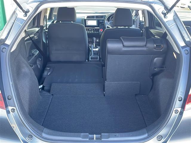 フィット １３Ｇ・Ｆ　禁煙車　純正ナビ　衝突軽減ブレーキ　レーンキープアシスト　バックカメラ　オートエアコン　アイドリングストップ　社外アルミホイール　シートリスター　電動格納ミラー　プッシュスタート　スマートキー　ＢＴ（31枚目）