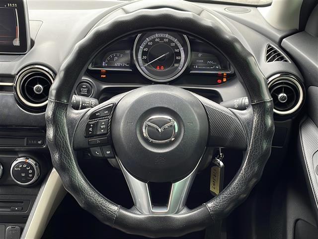 デミオ 13S アーバンスタイリッシュモード 禁煙車 純正ナビ 衝突軽減ブレーキ BSM オートライト スマートキー シートヒーター istop 社外ETC ステアリングリモコン バックカメラ フルセグTV プッシュスタート スマートキー BT(20枚目)