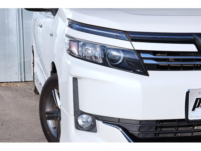 ヴォクシー ハイブリッドV 1オーナー モデリスタエアロ 9インチナビ TVキャンセラー 後席モニター Bluetooth LEDヘッドライト レーダー ドラレコ シートヒーター クルコン 片側電動スライド ETC バックカメラ(24枚目)