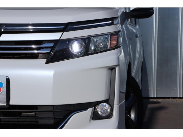 ヴォクシー ハイブリッドV 1オーナー モデリスタエアロ 9インチナビ TVキャンセラー 後席モニター Bluetooth LEDヘッドライト レーダー ドラレコ シートヒーター クルコン 片側電動スライド ETC バックカメラ(45枚目)