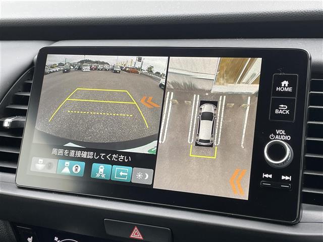 フィット ｅ：ＨＥＶリュクス　ワンオーナー　純正ナビ　アラウンドビューモニター　ドライブレコーダー　ＥＴＣ２．０　レーダークルーズコントロール　シートヒーター　ハンドルヒーター　オートライト　電格ミラー　スマートキー（5枚目）