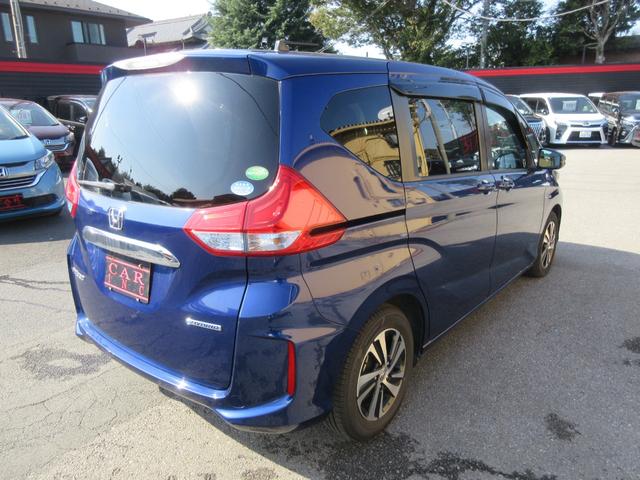 フリードハイブリッド ハイブリッド・Ｇホンダセンシング　ホンダセンシング　両側パワースライドドア　バックカメラ　ストラーダナビ　Ｂｌｕｅｔｏｏｔｈ　フルセグＴＶ　レーダークルーズコントロール　ハーフレザーシート　ＬＥＤヘッドライト　オートライト　ＥＴＣ（65枚目）