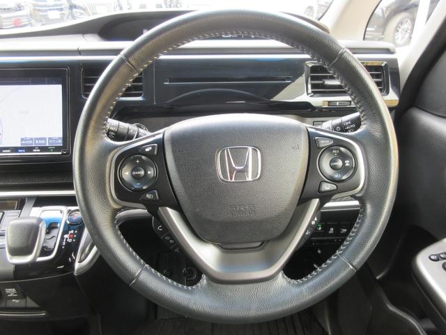 ステップワゴンスパーダ スパーダハイブリッド　Ｇ・ＥＸ　ホンダセンシング　ワンオーナー　ホンダセンシング　レーダークルーズコントロール　バックカメラ　両側パワースライドドア　純正ナビ　Ｂｌｕｅｔｏｏｔｈ　フルセグＴＶ　シートヒーター　ハーフレザーシート　ＬＥＤヘッドライト（12枚目）
