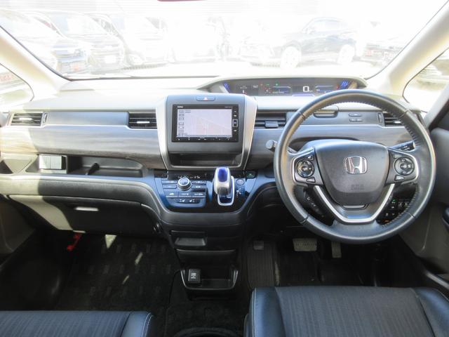 フリードハイブリッド ハイブリッド・Ｇホンダセンシング　４ＷＤ　ホンダセンシング　レーダークルーズコントロール　両側パワースライドドア　純正ナビ　Ｂｌｕｅｔｏｏｔｈ　クリアランスソナー　ハーフレザーシート　ＬＥＤヘッドライト　オートライト　ビルトインＥＴＣ（3枚目）