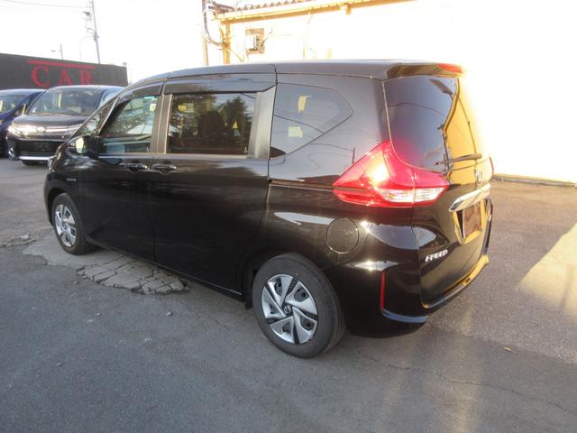 フリードハイブリッド ハイブリッド・Ｇホンダセンシング　ホンダセンシング　クリアランスソナー　レーダークルーズコントロール　両側パワースライドドア　純正ナビ　Ｂｌｕｅｔｏｏｔｈ　フルセグＴＶ　バックカメラ　シートヒーター　ＬＥＤヘッドライト　オートライト（69枚目）