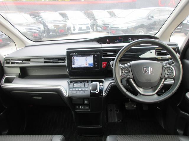 ステップワゴンスパーダ スパーダハイブリッド　Ｇ・ＥＸ　ホンダセンシング　後席フリップダウンモニター　ホンダセンシング　レーダークルーズコントロール　アラウンドビューモニター　純正ナビ　Ｂｌｕｅｔｏｏｔｈ　フルセグＴＶ　両側パワースライドドア　シートヒーター　オートライト（3枚目）