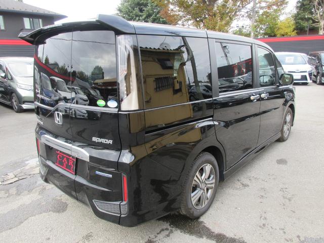 ステップワゴンスパーダ スパーダハイブリッド　Ｇ・ＥＸ　ホンダセンシング　後席フリップダウンモニター　ホンダセンシング　レーダークルーズコントロール　アラウンドビューモニター　純正ナビ　Ｂｌｕｅｔｏｏｔｈ　フルセグＴＶ　両側パワースライドドア　シートヒーター　オートライト（73枚目）