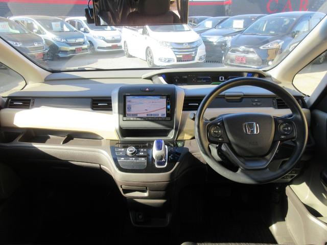 フリードハイブリッド ハイブリッド・Ｇホンダセンシング　ホンダセンシング　レーダークルーズコントロール　両側パワースライドドア　バックカメラ　純正メモリーナビ　Ｂｌｕｅｔｏｏｔｈ　フルセグＴＶ　ＬＥＤヘッドライト　オートライト　フロントドラレコ　ＥＴＣ（3枚目）