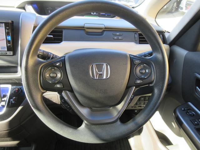 フリードハイブリッド ハイブリッド・Ｇホンダセンシング　ホンダセンシング　レーダークルーズコントロール　両側パワースライドドア　バックカメラ　純正メモリーナビ　Ｂｌｕｅｔｏｏｔｈ　フルセグＴＶ　ＬＥＤヘッドライト　オートライト　フロントドラレコ　ＥＴＣ（12枚目）