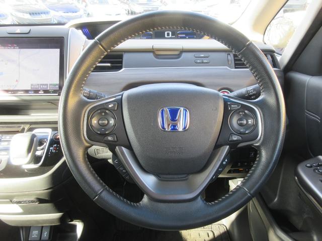 フリード＋ハイブリッド ハイブリッドＧ・ホンダセンシング　ホンダセンシング　レーダークルーズコントロール　両側パワースライドドア　バックカメラ　純正ナビ　Ｂｌｕｅｔｏｏｔｈ　フルセグＴＶ　シートヒーター　ハーフレザーシート　ＬＥＤヘッドライト　オートライト（12枚目）