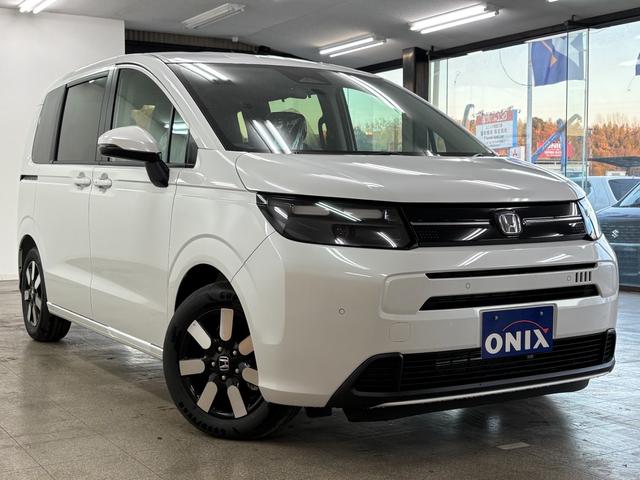 フリード エアー　ＥＸ　登録済未使用車　６人乗　両側自動ドア（6枚目）