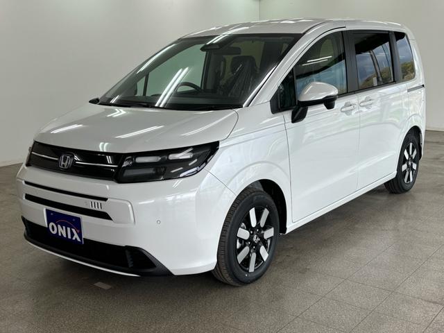 フリード ｅ：ＨＥＶエアー　ＥＸ　登録済未使用車　６人乗　両側自動ドア（8枚目）