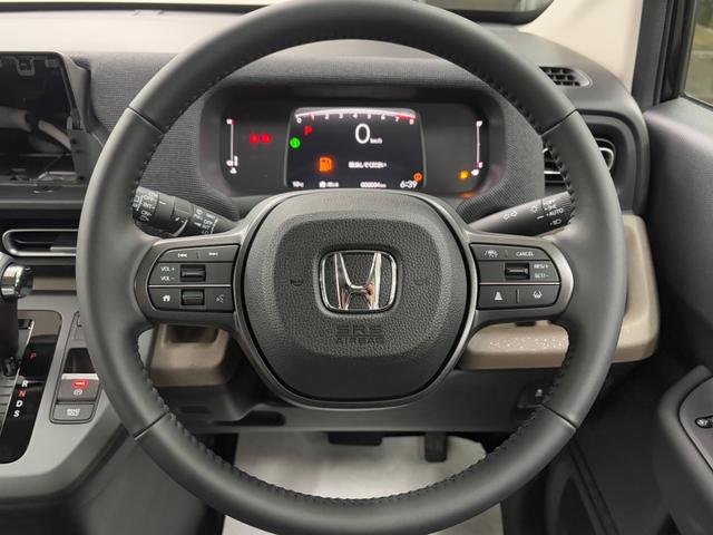 フリード ｅ：ＨＥＶエアー　ＥＸ　登録済未使用車　６人乗　両側自動ドア（59枚目）