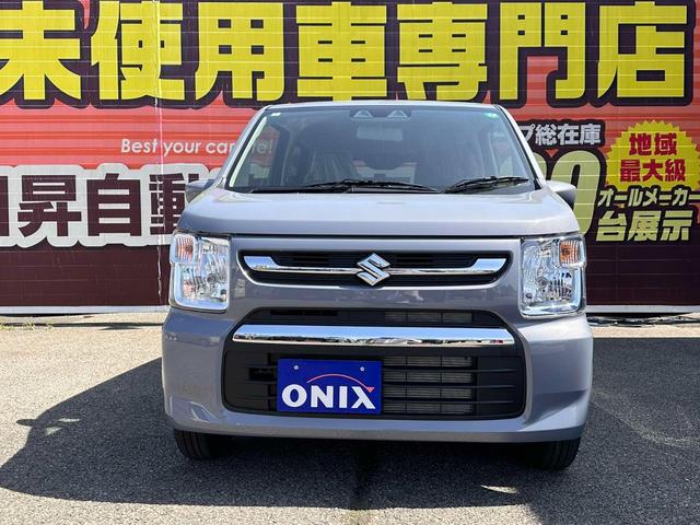 ワゴンＲ ＦＸ　届出済未使用車　衝突被害軽減システム　誤発進抑制装置　スマートキー　ハロゲンランプ　電動格納ミラー　運転席シートヒーター　オートエアコン　オートライト　助手席下収納ＢＯＸ　後部座席傘ホルダー（4枚目）