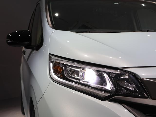 フリードハイブリッド ハイブリッド・Ｇブラックスタイル　運転支援機能（ホンダセンシング）　ＬＥＤヘッドライト　両側電動スライドドア　ＥＴＣ純正ナビ　Ｂｌｕｅｔｏｏｔｈ接続　ワンオーナー車　クルコン　誤発進抑制機能　Ｗパワスラ　ＵＳＢ入力　バックカメラ付き（14枚目）