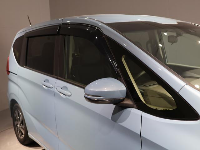 フリード Ｇ・ホンダセンシング　禁煙車　運転支援機能　衝突軽減ブレーキ　両側電動スライドドア　ＬＥＤヘッドライト純正９インチナビ　バックカメラ　Ｂｌｕｅｔｏｏｔｈ接続　リア席モニター　前後ドライブレコーダ　ＥＴＣ　Ｆセグ　ｉストップ（11枚目）