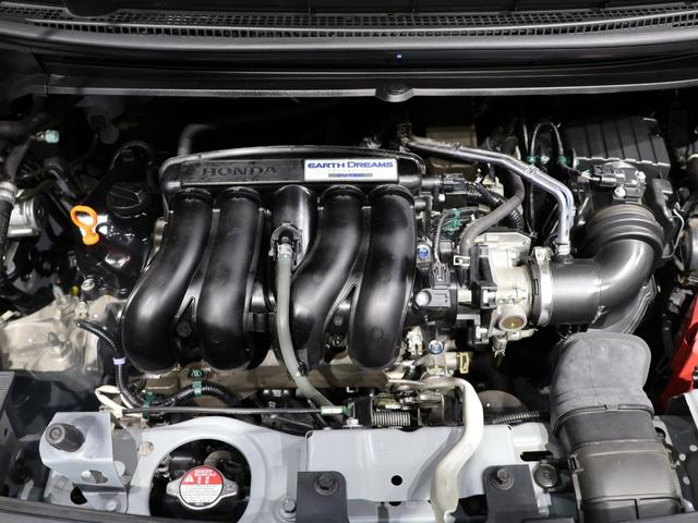 フリード Ｇ・ホンダセンシング　禁煙車　運転支援機能　衝突軽減ブレーキ　両側電動スライドドア　ＬＥＤヘッドライト純正９インチナビ　バックカメラ　Ｂｌｕｅｔｏｏｔｈ接続　リア席モニター　前後ドライブレコーダ　ＥＴＣ　Ｆセグ　ｉストップ（18枚目）