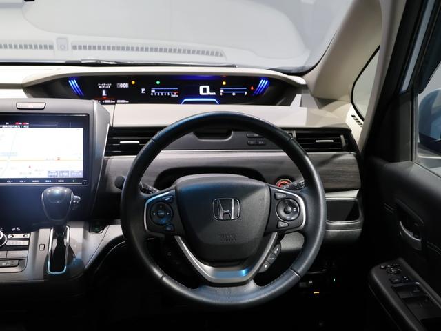 フリード Ｇ・ホンダセンシング　禁煙車　運転支援機能　衝突軽減ブレーキ　両側電動スライドドア　ＬＥＤヘッドライト純正９インチナビ　バックカメラ　Ｂｌｕｅｔｏｏｔｈ接続　リア席モニター　前後ドライブレコーダ　ＥＴＣ　Ｆセグ　ｉストップ（27枚目）