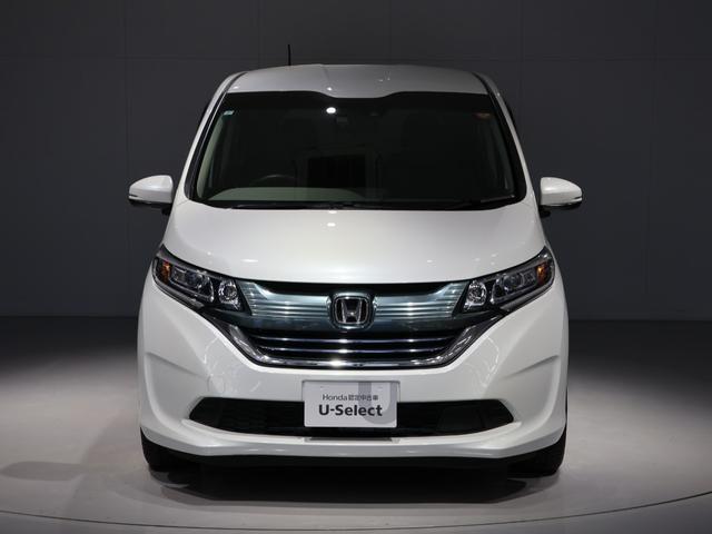 フリードハイブリッド ハイブリッド・EX 禁煙車 運転支援機能 衝突軽減ブレーキ 両側電動スライドドア LEDヘッドライト 純正9インチナビ バックカメラ Bluetooth接続 ドライブレコーダー シートヒーター ETC 1オナ 整備記録簿(8枚目)