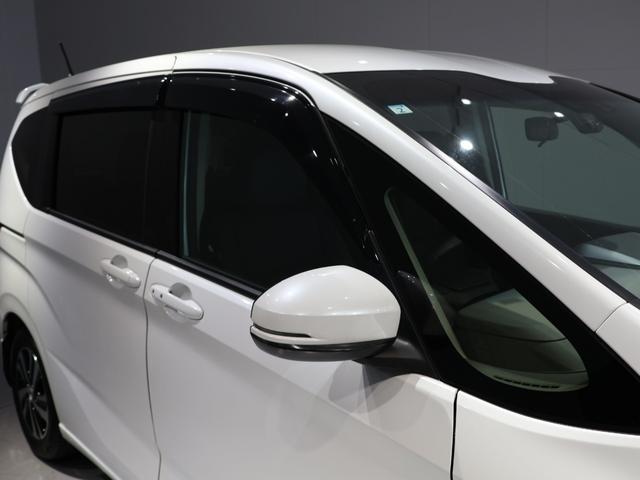 フリードハイブリッド ハイブリッド・EX 禁煙車 運転支援機能 衝突軽減ブレーキ 両側電動スライドドア LEDヘッドライト 純正9インチナビ バックカメラ Bluetooth接続 ドライブレコーダー シートヒーター ETC 1オナ 整備記録簿(10枚目)