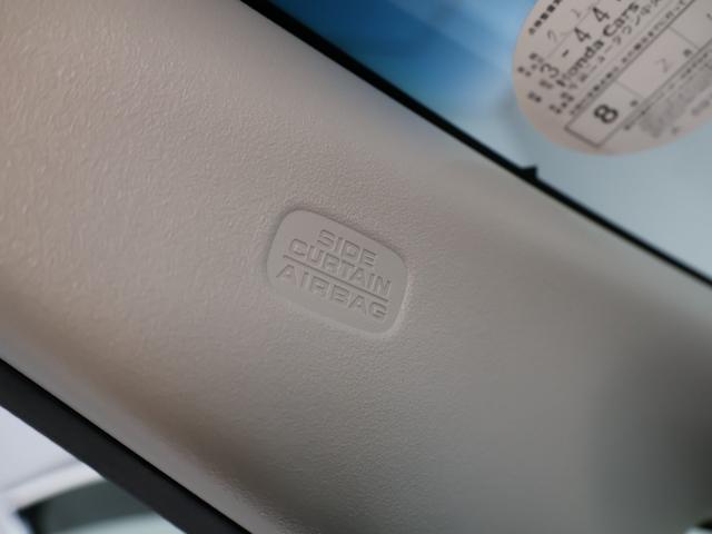 フリードハイブリッド ハイブリッド・EX 禁煙車 運転支援機能 衝突軽減ブレーキ 両側電動スライドドア LEDヘッドライト 純正9インチナビ バックカメラ Bluetooth接続 ドライブレコーダー シートヒーター ETC 1オナ 整備記録簿(54枚目)