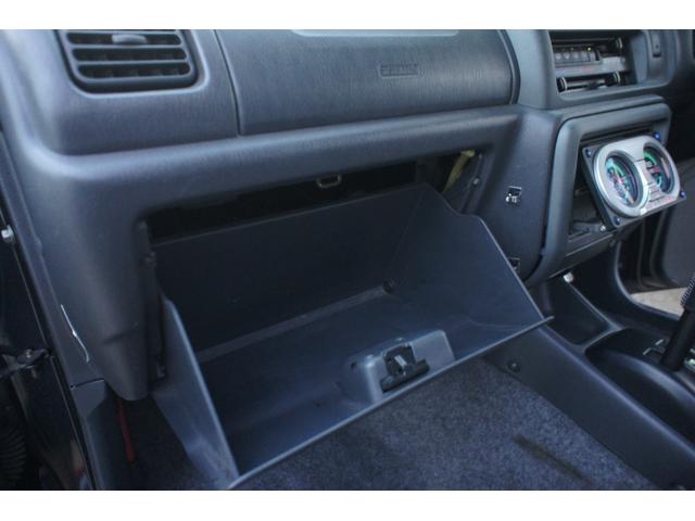 ジムニー 　ワイルドウインド　４ＷＤ　ターボ　フォグランプ　シートヒーター　ミラーヒーター　スペアタイヤカバースズキ純正ハードタイプ　キーレスエントリー　純正アルミホイール１６インチ（69枚目）
