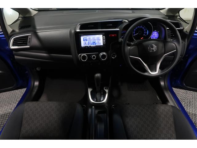 フィット 13G・Fパッケージ 禁煙 認定中古車 ドラレコ 純正ナビ ワンセグTV CD再生 DVD再生 Bluetooth ETC 保証1年付き 電動格納式ドアミラー ブルートゥース AUX対応 イモビ スマ-トキ- VSA PS(2枚目)