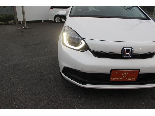 フィット ｅ：ＨＥＶホーム　純正ナビ／地上デジタル放送／バックカメラ／ホンダコネクト／純正１５インチホイール／障害物センサー／プッシュスタート／ＬＥＤヘッドライト／クルーズコントロール／電動格納ミラー（14枚目）