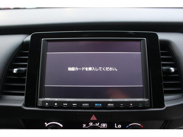 フィット ｅ：ＨＥＶホーム　純正ナビ／地上デジタル放送／バックカメラ／ホンダコネクト／純正１５インチホイール／障害物センサー／プッシュスタート／ＬＥＤヘッドライト／クルーズコントロール／電動格納ミラー（55枚目）