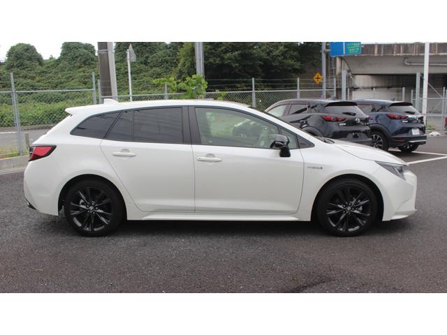 カローラツーリング ハイブリッド ダブルバイビー 純正ディスプレイオーディオ 禁煙車 地上デジタル放送 バックカメラ ハーフレザーシート LEDヘッドライト ETC レーダークルーズコントロール プッシュスタート 純正アルミホイール(10枚目)