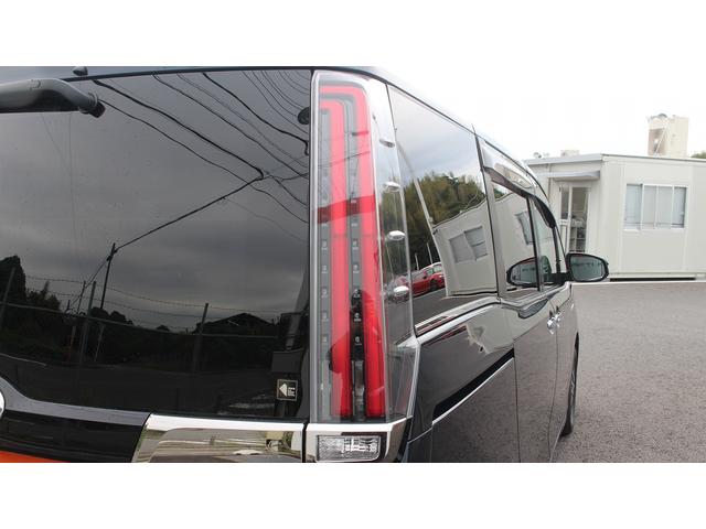 エスクァイア ハイブリッドGiプレミアムパッケジブラックテーラード 純正10型ナビ 禁煙車 フリップダウンモニター フルセグ バックカメラ クルーズコントロール LEDヘッドライト 両側電動スライドドア シートヒーター スモークメッキフロントグリル(22枚目)