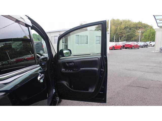 エスクァイア ハイブリッドGiプレミアムパッケジブラックテーラード 純正10型ナビ 禁煙車 フリップダウンモニター フルセグ バックカメラ クルーズコントロール LEDヘッドライト 両側電動スライドドア シートヒーター スモークメッキフロントグリル(29枚目)