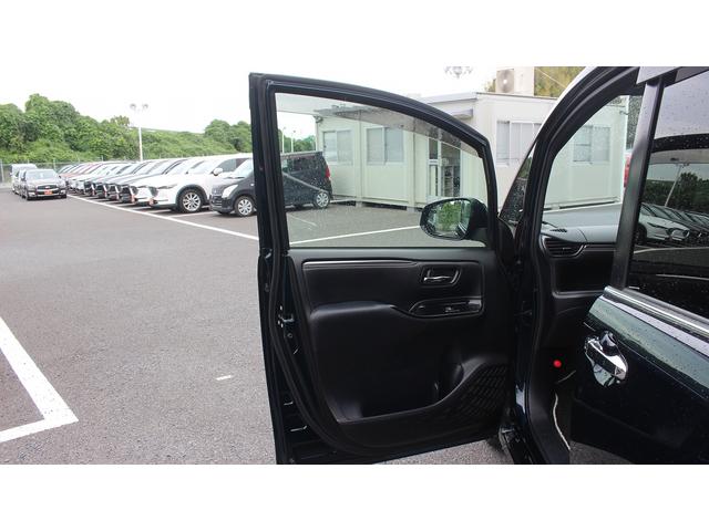 エスクァイア ハイブリッドGiプレミアムパッケジブラックテーラード 純正10型ナビ 禁煙車 フリップダウンモニター フルセグ バックカメラ クルーズコントロール LEDヘッドライト 両側電動スライドドア シートヒーター スモークメッキフロントグリル(50枚目)