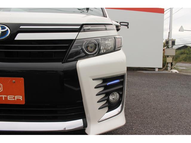 ヴォクシー ハイブリッドＺＳ　雹害　ＡＬＰＩＮＥ１０型ナビ　禁煙車　バックカメラ　フルセグＴＶ　ＥＴＣ　トヨタセーフティセンス　Ｂｌｕｅｔｏｏｔｈ接続　ｉｓｔｏｐ　両滴ワイパー　プッシュスタート　電動スライドドア（19枚目）