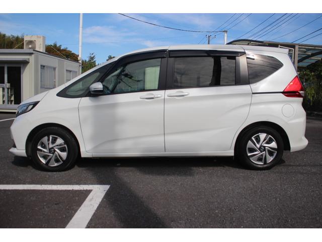 フリード+ハイブリッド ハイブリッドG 1オーナー 純正9型ナビ フルセグテレビ バックカメラ 両側電動スライドドア 衝突軽減ブレーキ 温熱シート LEDヘッドライト ETC スマートキー プッシュスタート(9枚目)