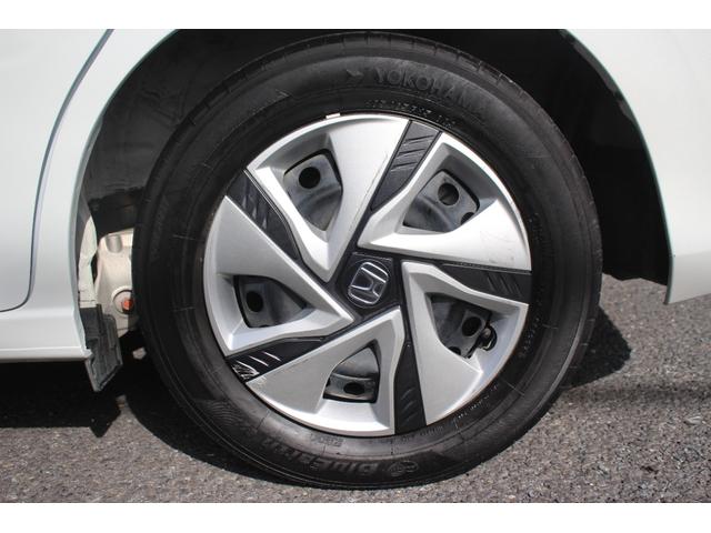 フリード+ハイブリッド ハイブリッドG 1オーナー 純正9型ナビ フルセグテレビ バックカメラ 両側電動スライドドア 衝突軽減ブレーキ 温熱シート LEDヘッドライト ETC スマートキー プッシュスタート(21枚目)