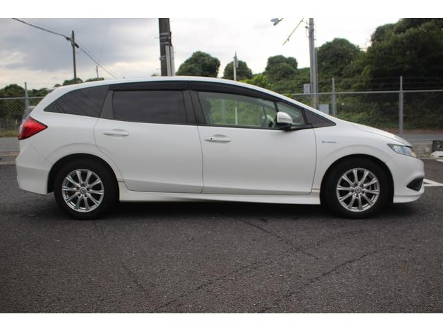 ジェイド ハイブリッド 純正ナビ 禁煙車 バックカメラ 地上デジタル放送 LEDヘッドライト 3列6人乗り クルーズコントロール 電動格納ミラー プッシュスタート オートライト 後席エアコン Bluetooth接続(11枚目)