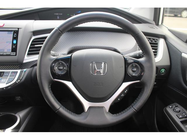 ジェイド ハイブリッド 純正ナビ 禁煙車 バックカメラ 地上デジタル放送 LEDヘッドライト 3列6人乗り クルーズコントロール 電動格納ミラー プッシュスタート オートライト 後席エアコン Bluetooth接続(50枚目)