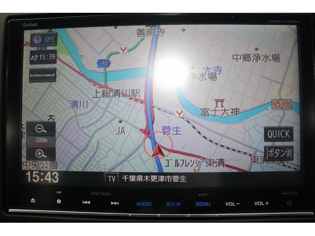 フリード＋ハイブリッド ハイブリッドＥＸ　純正９インチナビ　禁煙車　フルセグＴＶ　純正フリップダウンモニター　ＬＥＤヘッドライト　両側電動スライドドア　バックカメラ　シートヒーター　ハーフレザーシート　衝突軽減ブレーキ　レーンアシスト（3枚目）