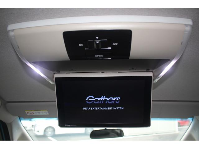 フリード＋ハイブリッド ハイブリッドＥＸ　純正９インチナビ　禁煙車　フルセグＴＶ　純正フリップダウンモニター　ＬＥＤヘッドライト　両側電動スライドドア　バックカメラ　シートヒーター　ハーフレザーシート　衝突軽減ブレーキ　レーンアシスト（7枚目）