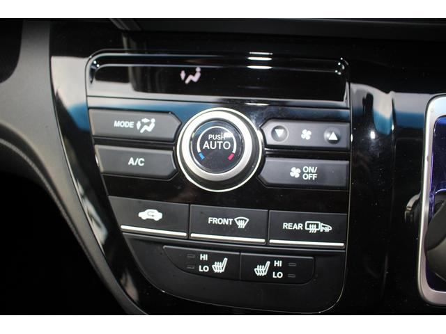 フリード＋ハイブリッド ハイブリッドＥＸ　純正９インチナビ　禁煙車　フルセグＴＶ　純正フリップダウンモニター　ＬＥＤヘッドライト　両側電動スライドドア　バックカメラ　シートヒーター　ハーフレザーシート　衝突軽減ブレーキ　レーンアシスト（9枚目）