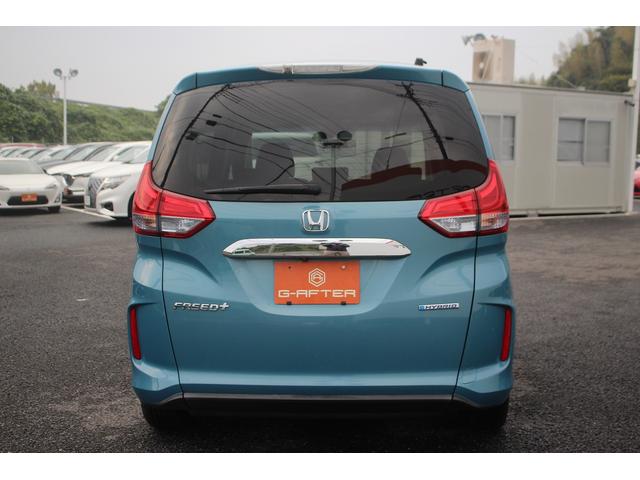 フリード＋ハイブリッド ハイブリッドＥＸ　純正９インチナビ　禁煙車　フルセグＴＶ　純正フリップダウンモニター　ＬＥＤヘッドライト　両側電動スライドドア　バックカメラ　シートヒーター　ハーフレザーシート　衝突軽減ブレーキ　レーンアシスト（14枚目）