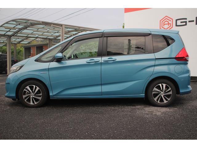 フリード＋ハイブリッド ハイブリッドＥＸ　純正９インチナビ　禁煙車　フルセグＴＶ　純正フリップダウンモニター　ＬＥＤヘッドライト　両側電動スライドドア　バックカメラ　シートヒーター　ハーフレザーシート　衝突軽減ブレーキ　レーンアシスト（16枚目）